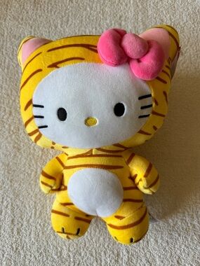Hello Kitty Plush in Yellow Tiger Costume with Pink Bow